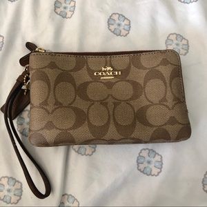 brown leather coach wristlet